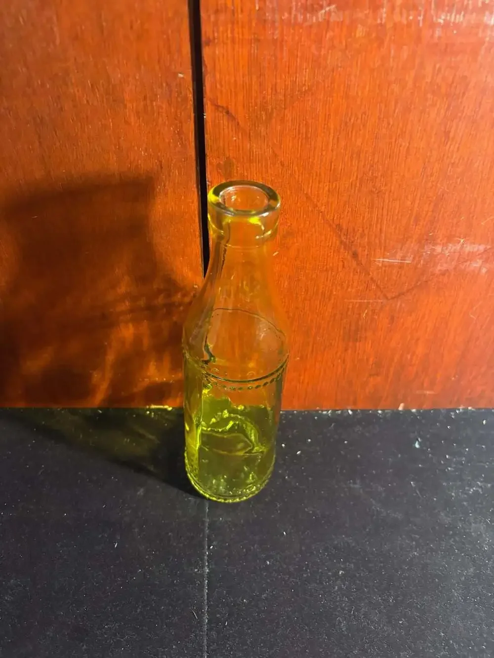 Vintage Yellow Green Glass Bottle with Beaded Embossed Accent